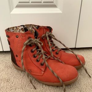 Enter “hiking style” small booties. Pinkish/orange